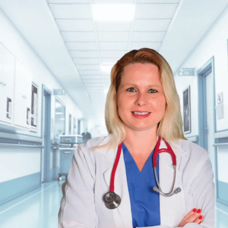 Teacher Gra in white lab coat in a hospital corridor